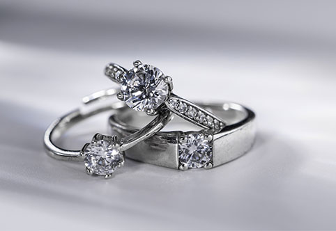 3 diamond engagement rings in white precious metals